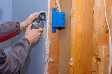 In this renovation service plasterboard that has become damaged will be cut off with use of multi tool oscillating with multi positional head