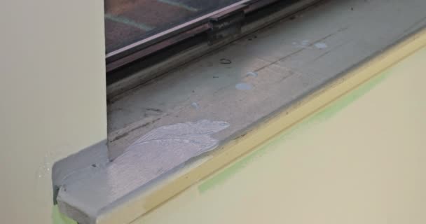 Repairman Painting Painting Window Molding Trim Using Paintbrush Renovation Apartment — Vídeo de stock