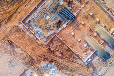 Bulldozer is working on site of construction project preparing land for construction new building industry place