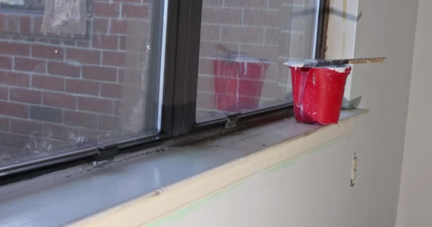 Apartment Renovation Underway Painter Painting Window Molding Trim Using Paintbrush — 图库视频影像