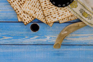 For Pesach unleavened matzah bread is eaten and kosher kiddush cup wine is used to celebrate holiday.
