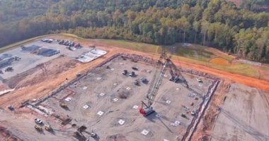 In process of building residential complex lot construction equipment was used