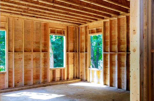 stock image View of wood framing beams that are being used in construction new house that is under construction