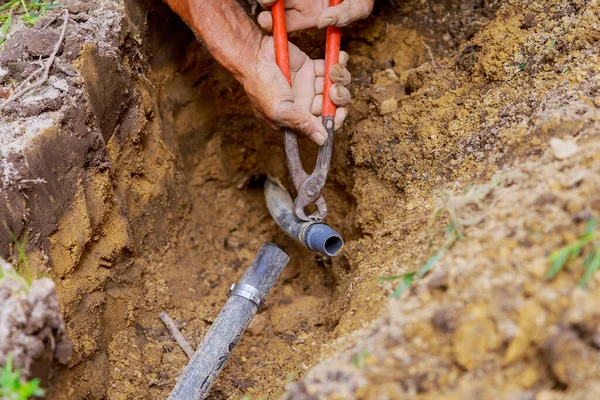 Man Working Pipes Ground While Installing Underground Sprinkler System Water — Stock Photo, Image
