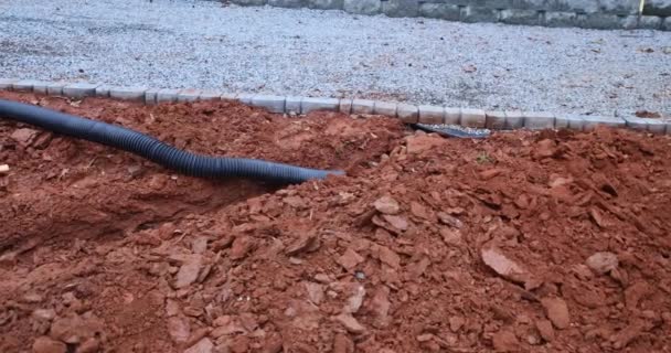Worker Digs Trench Order Lay Drainage Pipes Rainwater Times Heavy — Vídeos de Stock