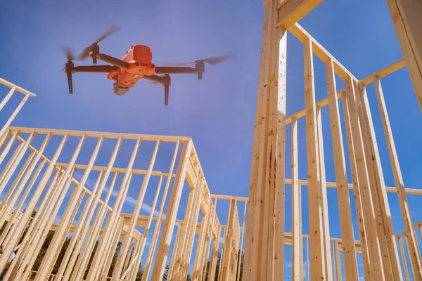 On construction site inspector with help of drone checks quality construction works