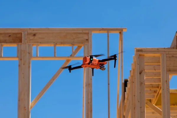 Stock image As construction inspector on site drone is used to check quality of construction work