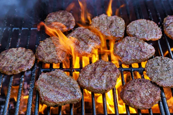 On bbq fire flame grill was prepared in order to cook grilled beef meat barbecue burgers for hamburgers