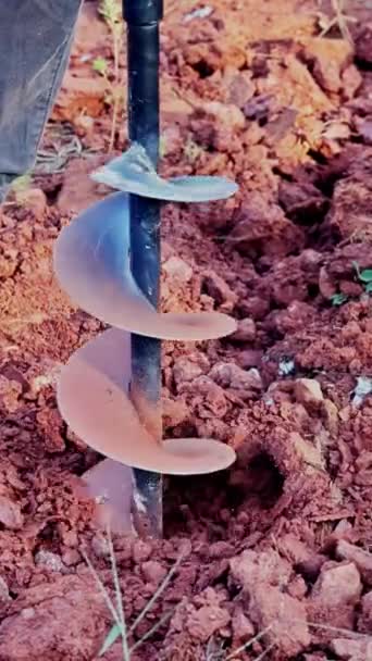 Gasoline Drilling Machine Worker Digs Ground Preparation Installation Fence Posts — Stock Video