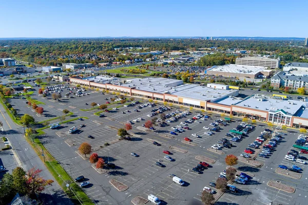 stock image Parking lot for cars on large asphalt surface located near shopping center in New Jersey that is half empty