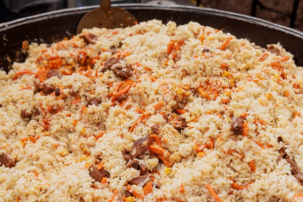 Street food festival is great opportunity to experience Uzbek pilaf being cooked in cauldron