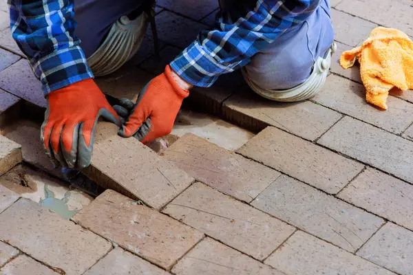 stock image In reconstruction, destroyed brick path is replaced with new one