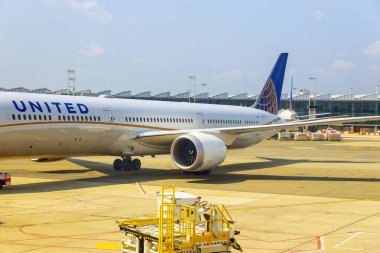 14 Haziran 2024, ABD Haber Ajansı. ABD 'nin New Jersey eyaletindeki Newark Liberty Uluslararası Havalimanı' ndaki United Airlines UA 'dan Boeing 787-10 uçağının görüntüsü