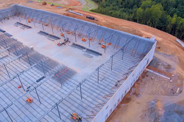 stock image Installation of steel structure roof truss frame during construction warehouse