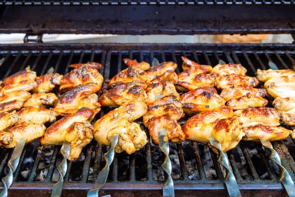 stock image Charcoal BBQ grill at used to grill chicken wings is American cuisine