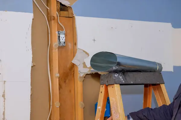 stock image Ventilation HVAC system is installed in room of house while it is being reconstructed