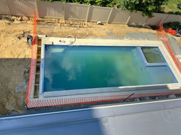 stock image Swimming pool near house is being constructed using structure