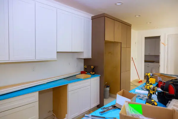 stock image Constructing new custom kitchen cabinet during construction of home improvement project