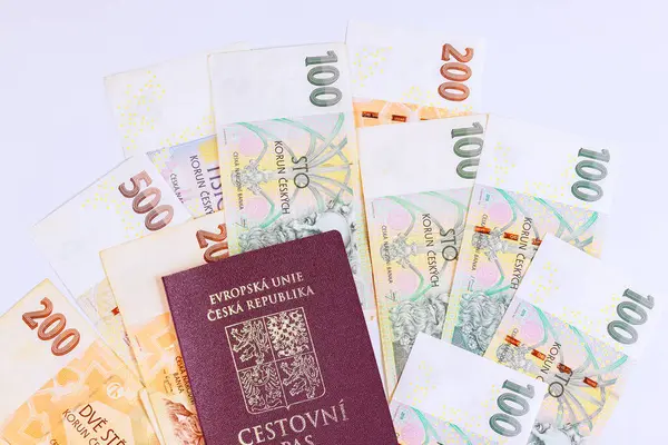stock image With Czech passport, Czech banknotes in various denominations of CZK koruna can be obtained