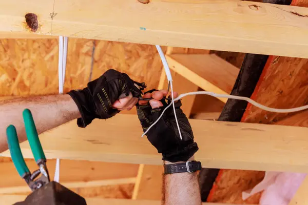 stock image Wiring ceiling light lamp electrical is mounted by an electrician