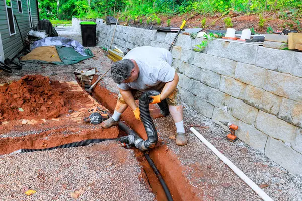 stock image In trench underground, drainage pipes are laid assembled for outflow of rainwater stormwater