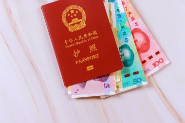 Çin Halk Cumhuriyeti pasaportu Çin Yuan parası içermektedir.
