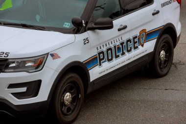 20 August 2024 Sayreville NJ USA: Sayreville police SUV is parked along city street, displaying emergency markings officers are present, ensuring safety clipart