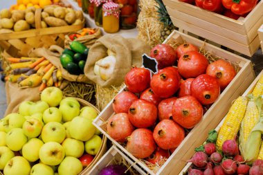 Assortment of fruits, vegetables displayed in baskets at farmers local market, showcasing seasonal harvest delights. clipart