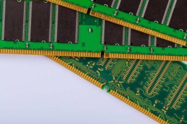 Various circuit boards with memory RAM modules chips are arranged neatly, intricate connections components.