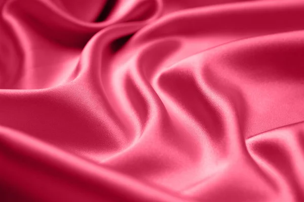 Viva Meganta为红色洋红色面料地图集配色 关闭粉红色丝绸缎子纹理为缝纫 摘要背景墙纸 捻褶皱布 2023年流行的色彩 时尚色彩图案 — 图库照片