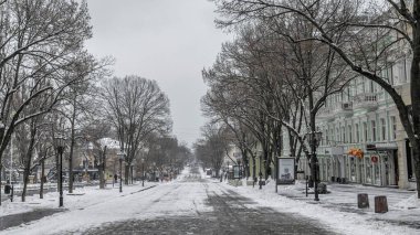 Odessa, Ukraine 29.01.2023. Deribasovskaya street in Odessa, Ukraine, on a gloomy winter day