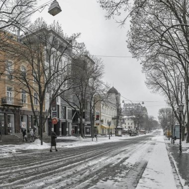Odessa, Ukraine 29.01.2023. Deribasovskaya street in Odessa, Ukraine, on a gloomy winter day