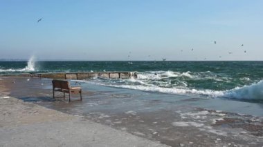 Odessa, Ukraine 08.02.2023. The coast of the stormy Black Sea on Lanzheron beach in Odessa, Ukraine, on a sunny winter day