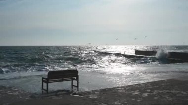Odessa, Ukraine 08.02.2023. The coast of the stormy Black Sea on Lanzheron beach in Odessa, Ukraine, on a sunny winter day