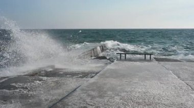 Odessa, Ukraine 08.02.2023. The coast of the Black Sea on Lanzheron beach in Odessa, Ukraine, on a sunny winter day