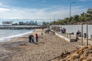 Odessa, Ukraine 18.02.2023. Fontanka beach and promenade in Odessa, Ukraine, on a sunny winter day