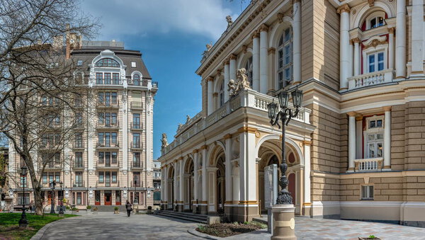 Odessa, Ukraine 15.04.2023. City square Palais Royal and Opera facade in Odessa, Ukraine, on a sunny spring day