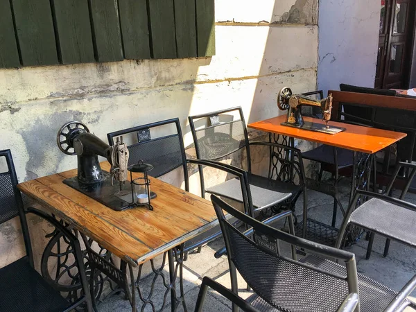 Krakow, Poland: Singer klub caf with sewing machines as coffee tables