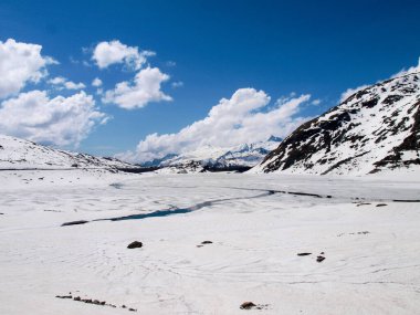 Pass of Spluga, Italy: alpine snowy landscape in spring