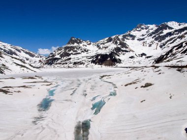 Pass of Spluga, Italy: alpine snowy landscape in spring