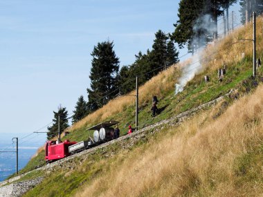 Monte Generoso, Switzerland - August 26, 2018: Firefighters rescue train