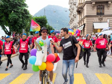 Lugano, Switzerland - June 2, 2018: Pride Lugano 2018. Public event for homosexual rights with a parade on the lakeside of the city.