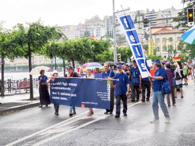 Lugano, Switzerland - June 2, 2018: Pride Lugano 2018. Public event for homosexual rights with a parade on the lakeside of the city.
