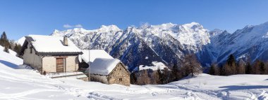 Blenio, Switzerland: Mountain panorama of the ski area in the Lepontine Alps clipart