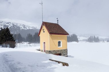 Lenzerheide, Switzerland: Winter landscape of the ski resort clipart