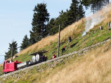 Monte Generoso, Switzerland - August 26, 2018: Firefighters rescue train