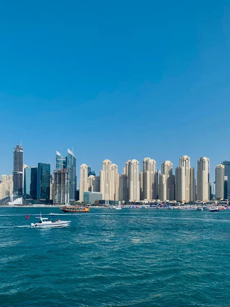 stock image Dubai, UAE - 03.20.2022: Jumeirah beach residence marine cityscape with buildings, sea and boats, view from Bluewaters island