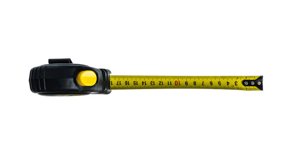 Yellow measuring tape isolated on white background. High quality photo