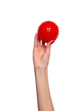 Beyaz arka planda izole edilmiş tetikleme noktaları için kırmızı topa masaj yapın. Miyofasyal tahliye kavramı. Yüksek kalite fotoğraf