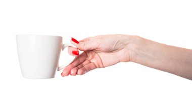 Kupa beyaz arka planda izole edilmiş kadınların elinde. Boş bardak. Yüksek kalite fotoğraf